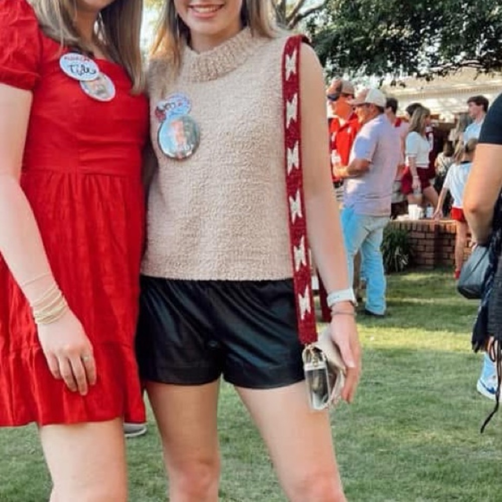 Red Puff Sleeve Dress and Beige Knit Top with Black Shorts